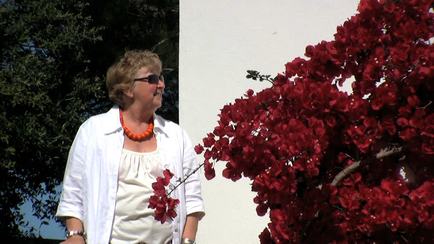 Senior relaxing at a Villa in the sun 