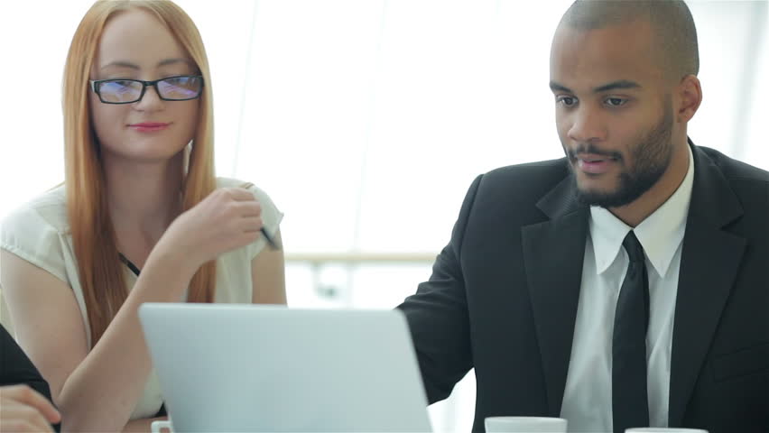 Boss Scolding Employee Because She Is Playing With Mobile Phone At Her