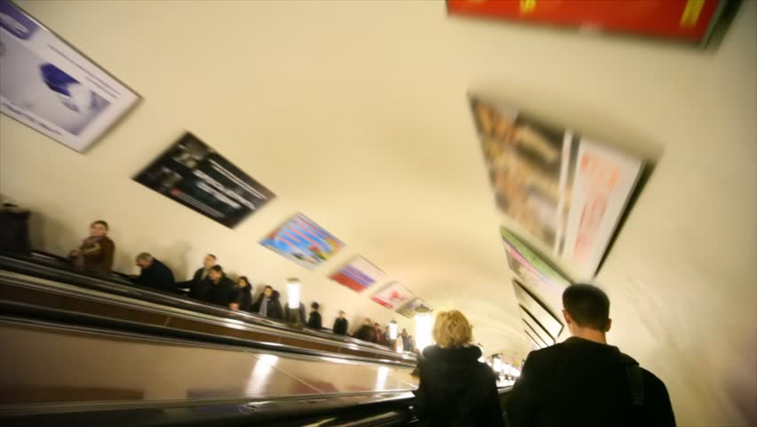  Moscow - March 23: People ride the escalator in Komsomolskaya station of Moscow subway, March 23, 2010 in Moscow, Russia. The Moscow Metro is the world's second most heavily used rapid transit system after Tokyo's twin subway.