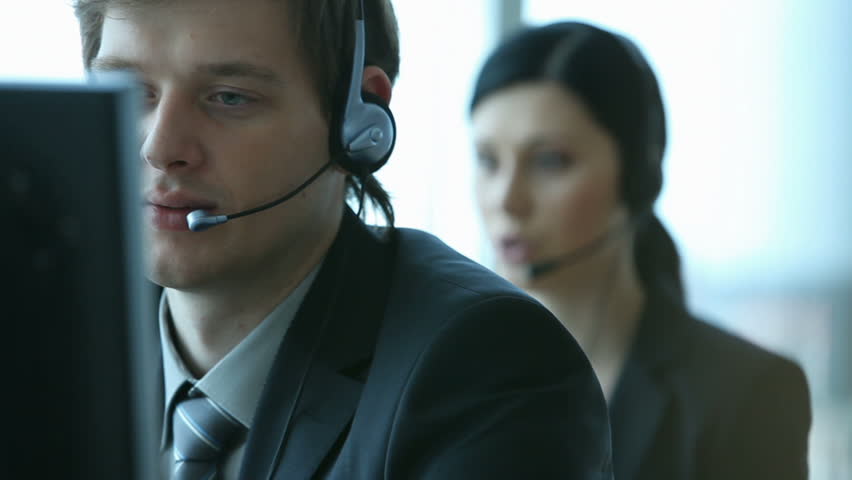 Company representative using headset to talk on the hot line