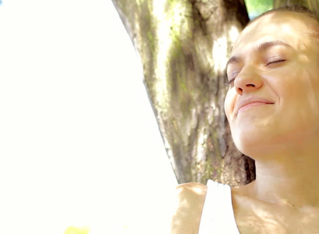 Happy woman relaxing, pan shoot - NTSC