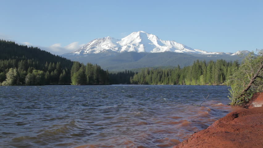 Lake Siskiyou, a Sacramento River reservoir, with Mt Shasta in the background.