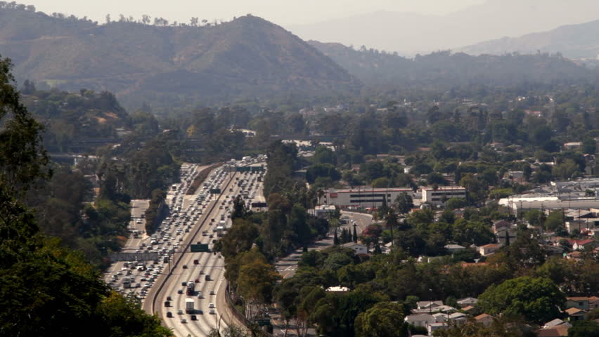 A super wide time lapse of rush hour traffic on Interstate-5, near Los Angeles, CA.