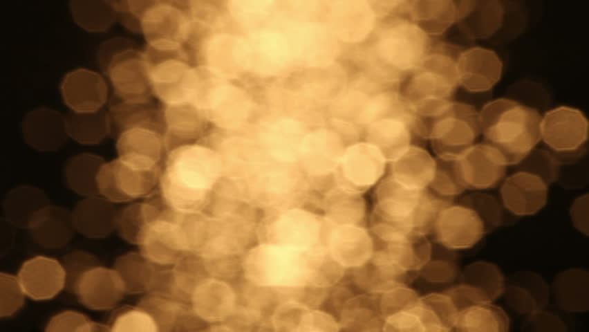 De-focused water glittering at sunset. Motion background. 