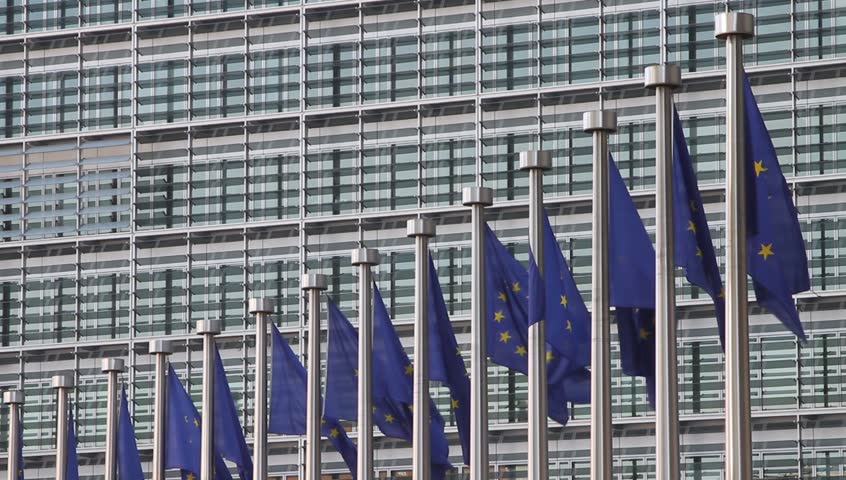 European Flags floating in front of the European Commission building in Brussels