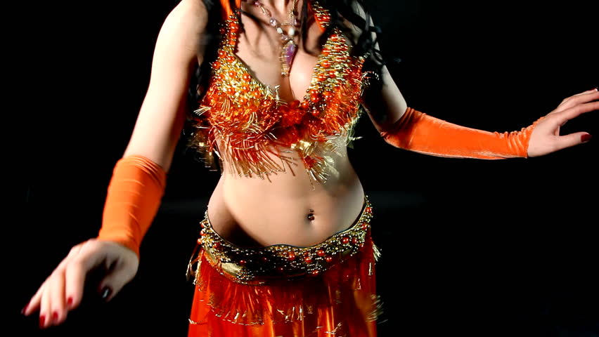 woman dancing in traditional arabic costume 