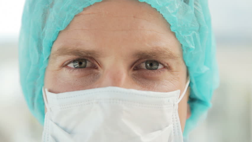 Closeup of a Male Surgeon in Scrubs