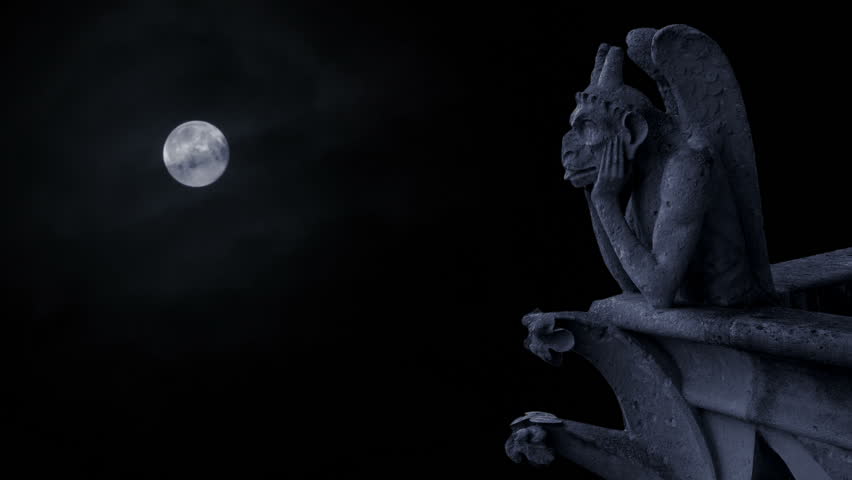 Gargoyle on Notre-Dame, Paris, moonlight.