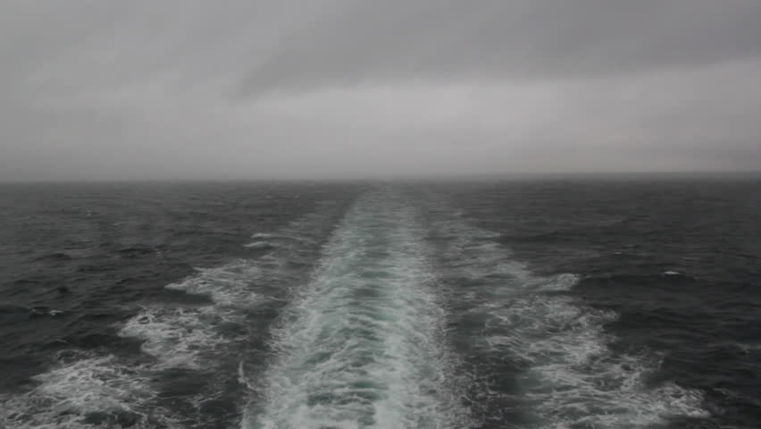 Stormy ship wake. Looking out at rear of ferry. Stormy sea and sky. Crossing from Nanaimo to Vancouver. British Columbia, Canada. 