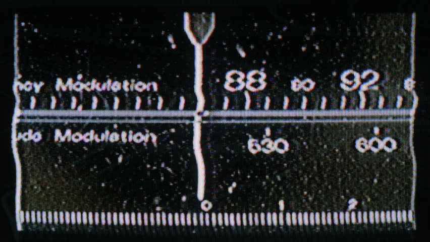 old style radio dial tuning to stations and freqencies