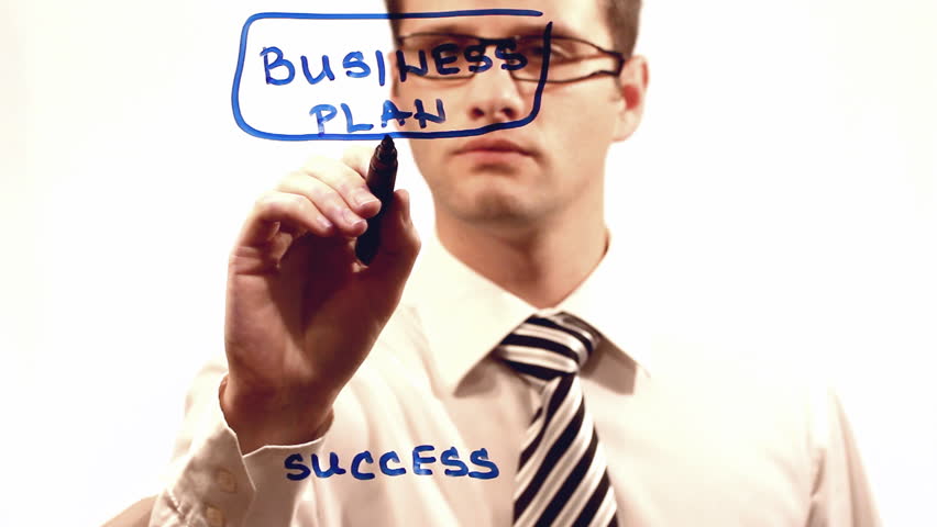 Businessman drawing plan for success.