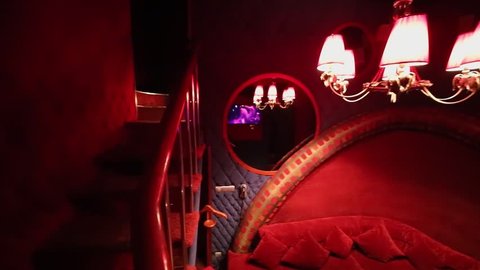 Moscow Dec 09 2016 Private Room With Stairs Red Sofa And Pillows In White Bear Strip Club