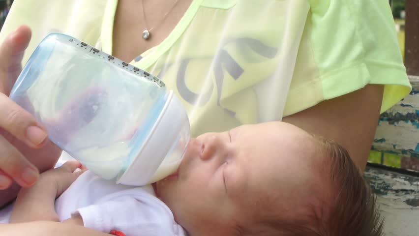 Baby Suckling Milk From Feeding Stock Footage Video 100