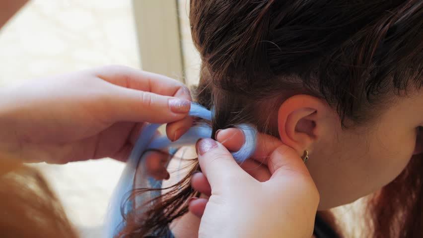 Hairdresser Weaves Braids With Kanekalon Stock Footage Video