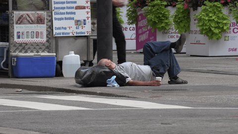 Toronto, Ontario, Canada April 2019 Homeless Person the Streets Of Wealthy Financial District
