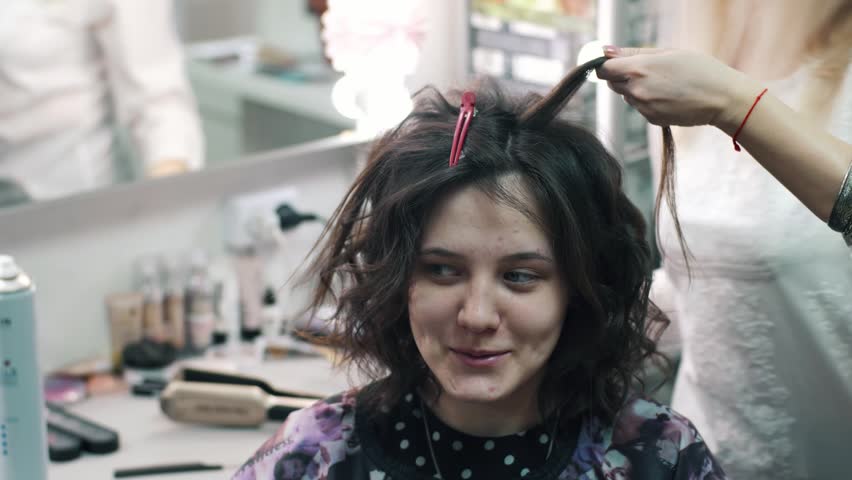Hairdresser Makes A Solemn Hairstyle Stock Footage Video 100