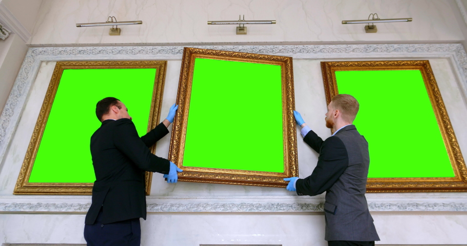 Museum Workers Hanging A Picture Stock Footage Video 100