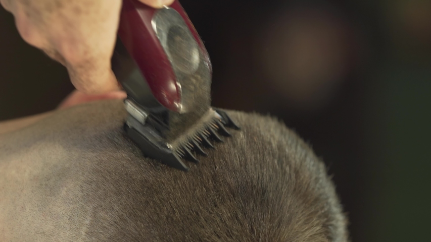 The Barber Uses Haircut Machine Stock Footage Video 100 Royalty Free 1033350668 Shutterstock