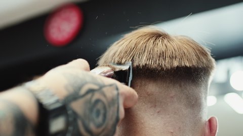 Barber Cuts The Hair Of Stock Footage Video 100 Royalty Free