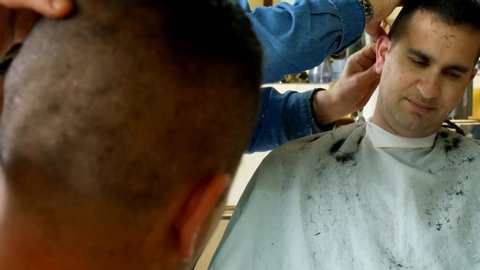 Man Getting A Short Haircut In A Retro Style Barbershop Before Going To The Army
