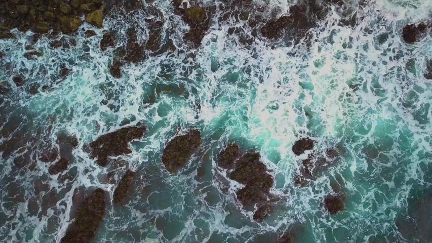 Waves washing over rocks on the shoreline image - Free stock photo ...