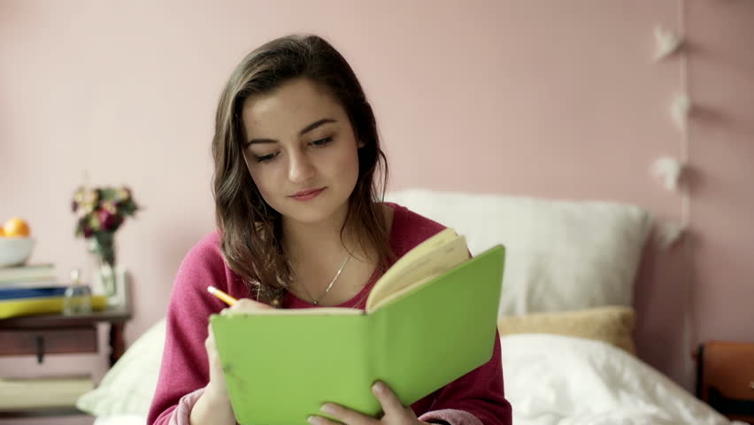 Teenage Girl Writing in Her Stock Footage Video (100% Royalty ...