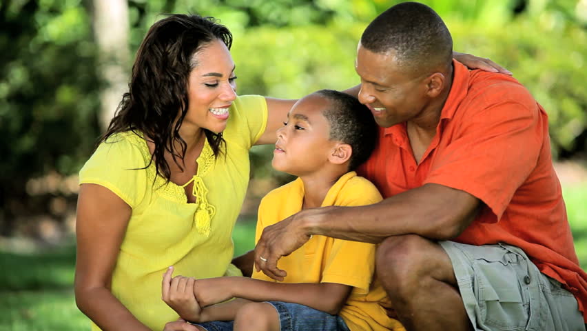 Portrait Of Happy Young African American Family Enjoying The Park Stock ...