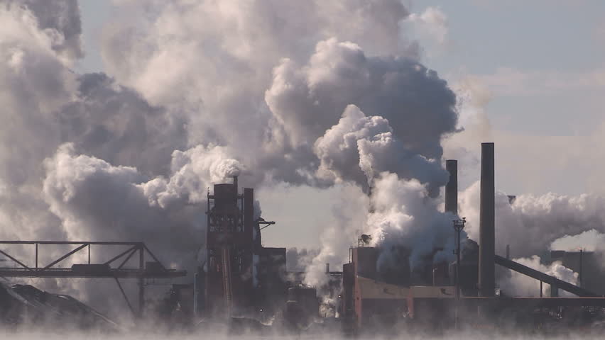 Ontario, Canada February 2016 Clouds of steam and smoke from heavy industry factory and plant