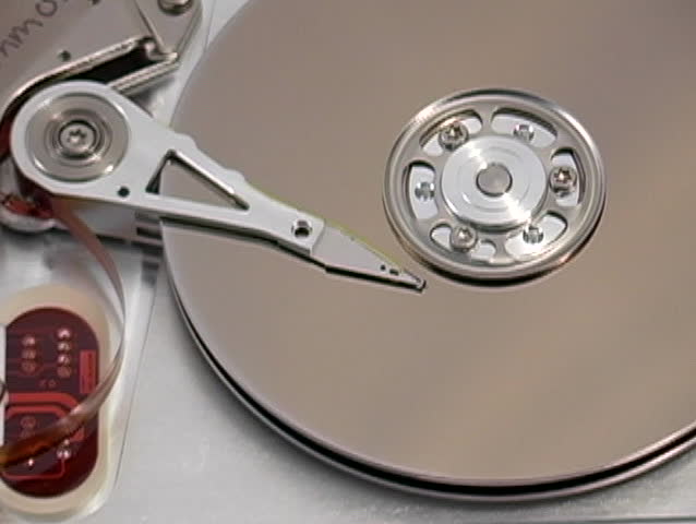 Close Up Of The Inner Workings Of A Computer Hard Drive. Stock Footage ...