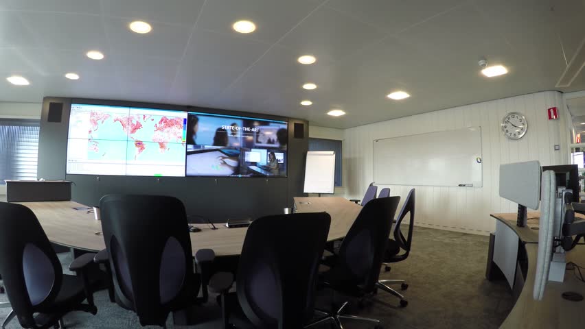 Round Table Stock Footage Video Shutterstock Office High Tech Meeting Room Low Angle Two Very Large Screens One With Earth Map Other