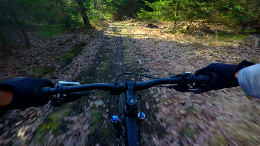 Speed Riding Downhill A MTB Bike On Mountain Dirt Road View From First