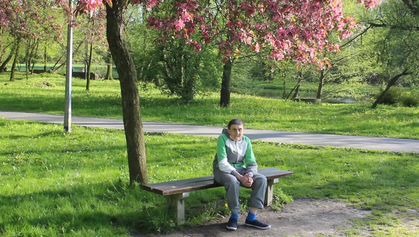 Hd00 13the Man The Disabled Person Sitting On A Bench In A Park And