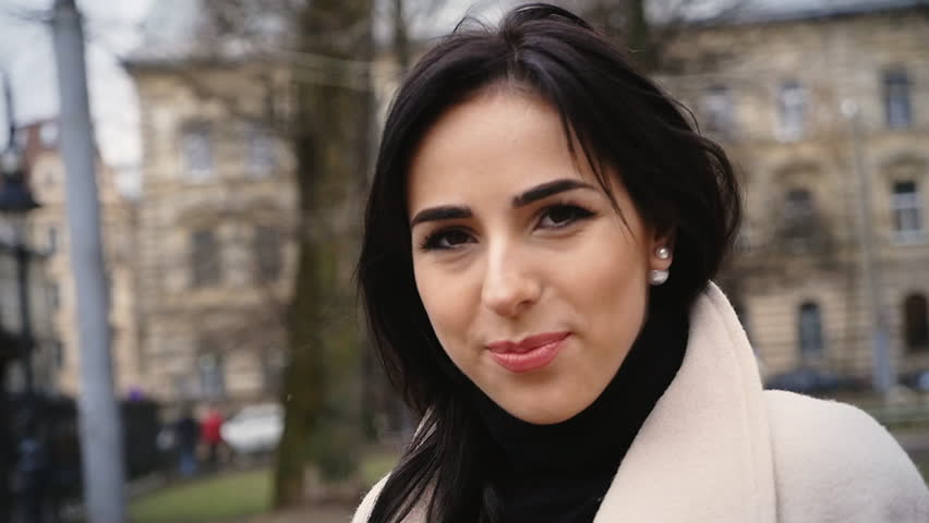 Stock Video Clip ofy young woman with long dark hair 