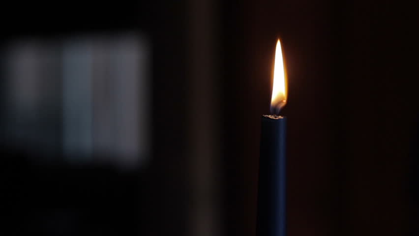 Moving Finger Through Candle Flame Stock Footage Video (100% Royalty