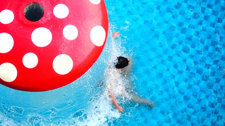 Pool Water With Beach Ball childrens playing beach ball floating on water in swimming pool Pool Water With Beach Ball childrens playing beach ball floating on water in swimming pool