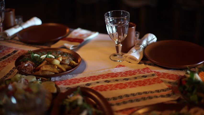 Russian Tradition. Candles At Dinner. Table Setting. Dark Room ... Russian Tradition. Candles At Dinner. Table Setting. Dark Room ...