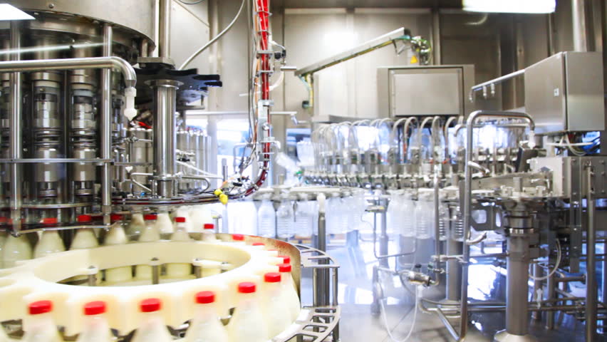 Fresh Milk Poured Into Bottles, Screwed Red Caps And Send To Consumers 库存影片视频 1866304 | Shutterstock