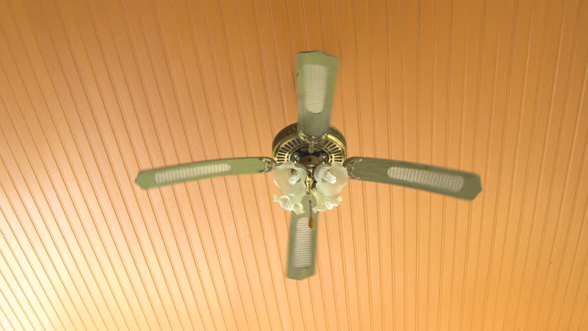 Ceiling Fan Spinning Slowly And Gradually Coming To A Stop White Abstract Vintage Fan Lamp Hanging On The Ceiling 4k Stock Footage Clip