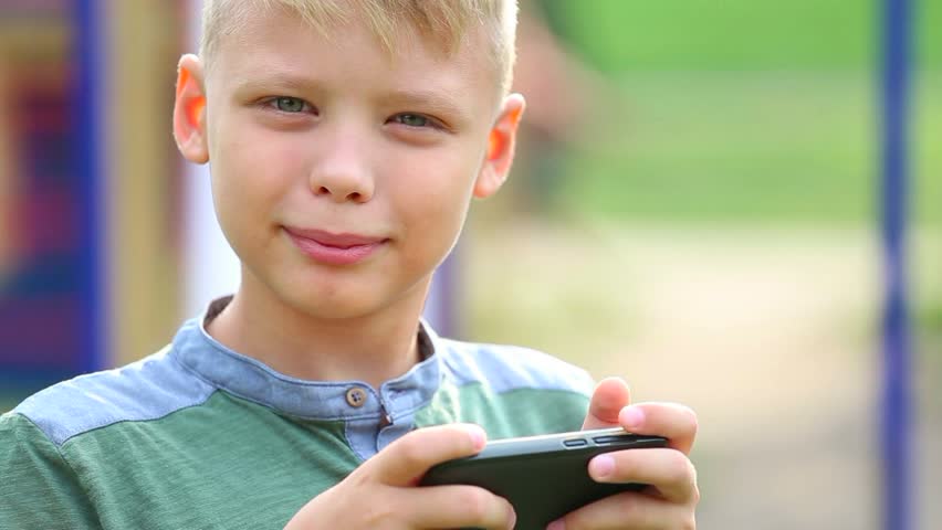 Hd00 30close Up Portrait Of Cute Funny Face Of Kid Playing Computer