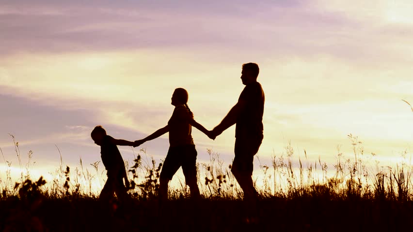 Family of three persons walking together… - Royalty Free Video