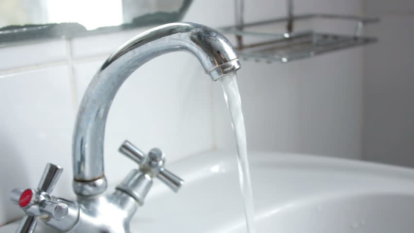 Woman Turning Off Hot Water Bathtub Faucet In The Bathroom Stock Water From Opened Faucet Hd Stock Video Clip