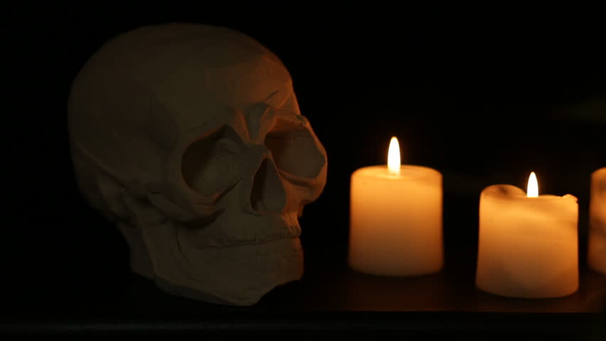 abstract halloween background composition with skull and candles shot with slider seamless loop - Halloween Background Video abstract halloween background composition with skull and candles shot with slider seamless loop - Halloween Background Video