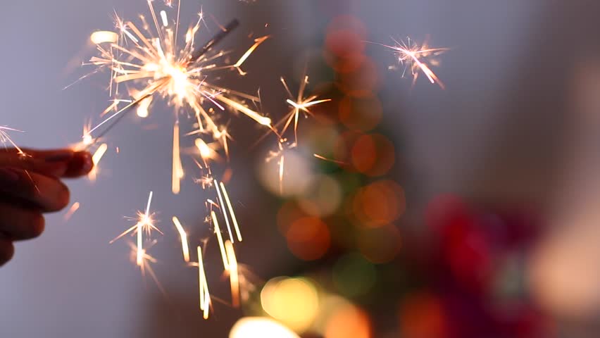 Woman Hand Holds Sparklers Stock Footage Video (100% Royalty-free ...