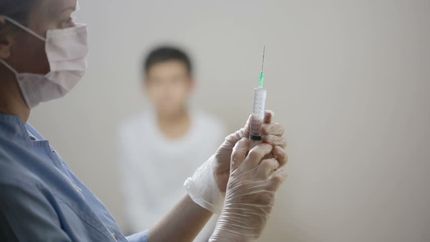 Little Girl Is Afraid Of The Doctor With A Syringe Baby Cries Afraid