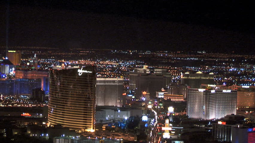 Aerial View Of Las Vegas At Night With The Airport And Airplanes Taking ...