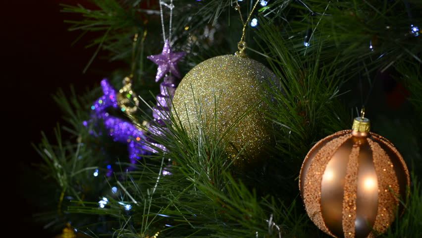 hd0016festive christmas tree with jewel color decorations close up focus on baubles static - Jewel Colored Christmas Decorations hd0016festive christmas tree with jewel color decorations close up focus on baubles static - Jewel Colored Christmas Decorations