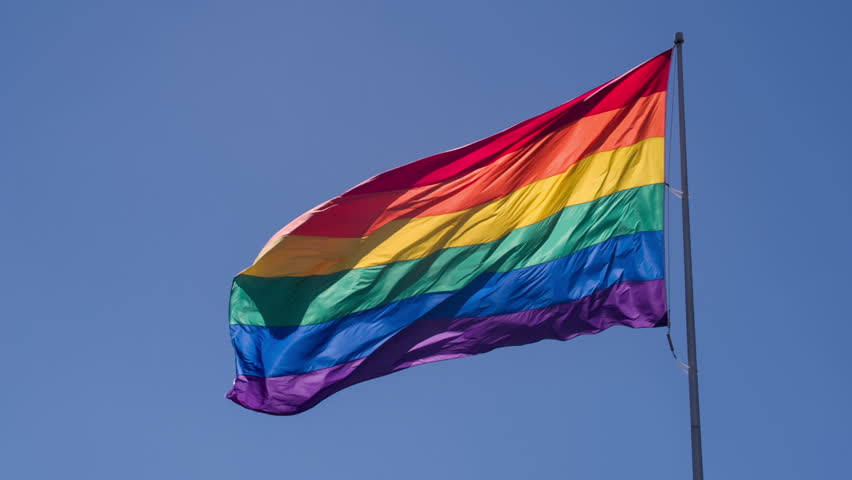 Slow Motion Gay Pride Flag Blowing In The Wind. Stock Footage Video ...