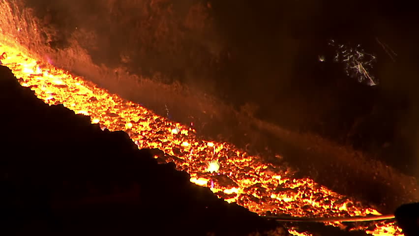 Stock Video Clip of The flow of hot molten metal. Lava | Shutterstock