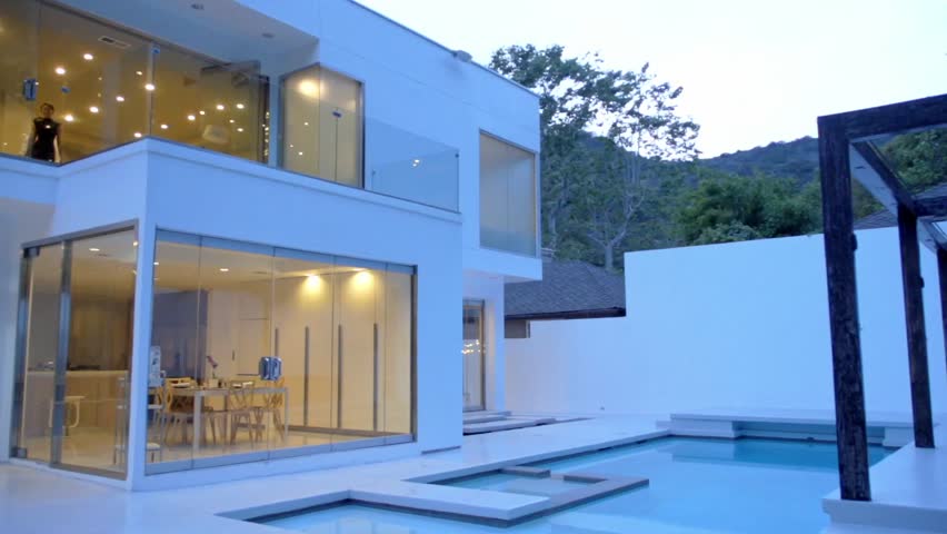 love couple in the modern contemporary luxury house in beverly hills hd stock - Contemporary Luxury Homes love couple in the modern contemporary luxury house in beverly hills hd stock - Contemporary Luxury Homes