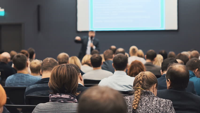 The Speaker Tells The Speech At Conference. Business People Seminar ...